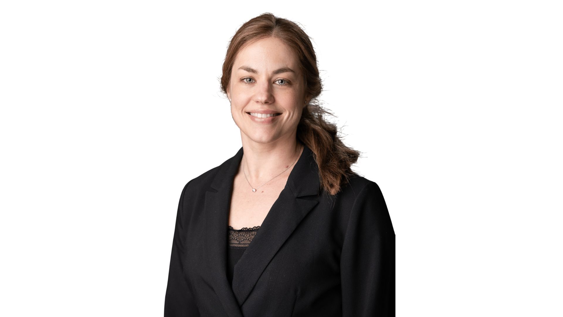 Rianne Buter, Unilever’s Global Head of Sustainability. A white woman with brown hair and a black suit, smiling.