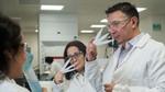 Three scientists (one male, two female) sniffing fragrance testers at Unilever’s Port Sunlight lab.