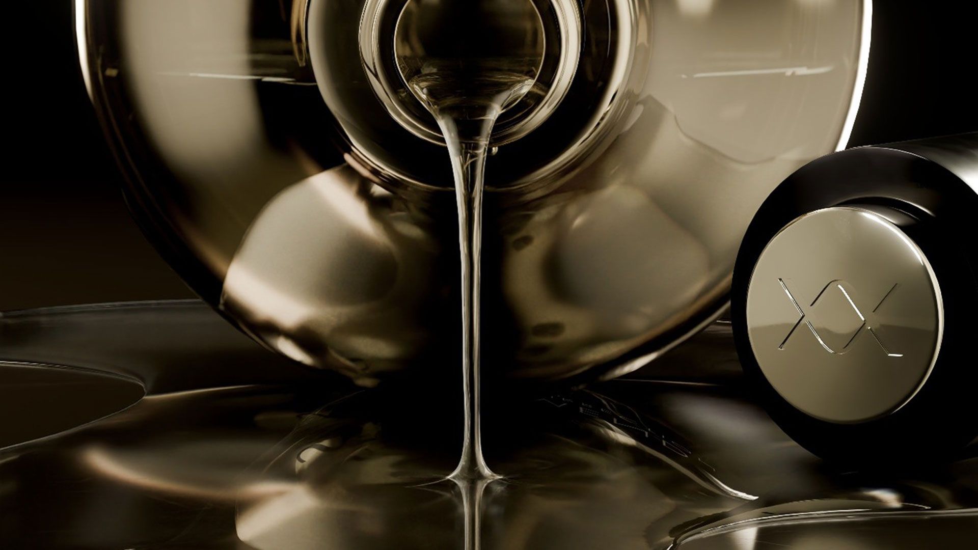 Close-up of NEXXUS Oil Resurrection – a glossy, metallic bottle pouring a smooth, golden liquid onto a reflective surface, with a matching cap featuring an ‘XX’ engraving.