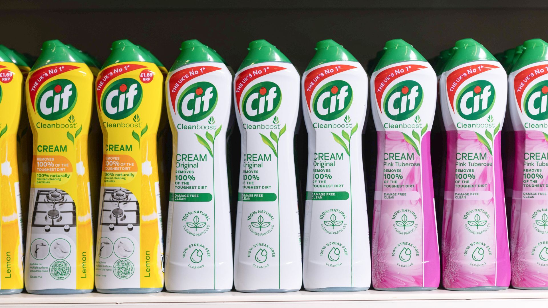 A selection of Cif Cream products on a supermarket shelf.