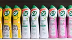 A selection of Cif Cream products on a supermarket shelf.